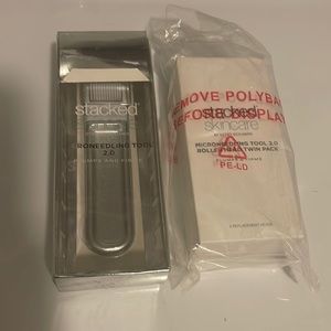 Stacked Skincare Microneedling Tool 2.0 with an extra roller head twin pack